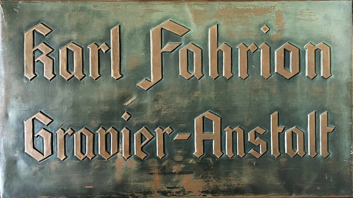 company sign Karl Fahrion